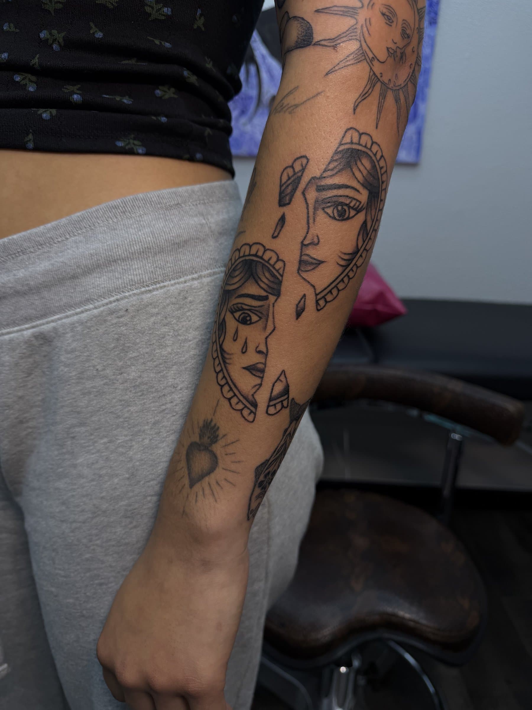 Black and grey ornamental sleeve — sun, crying women, sacred heart