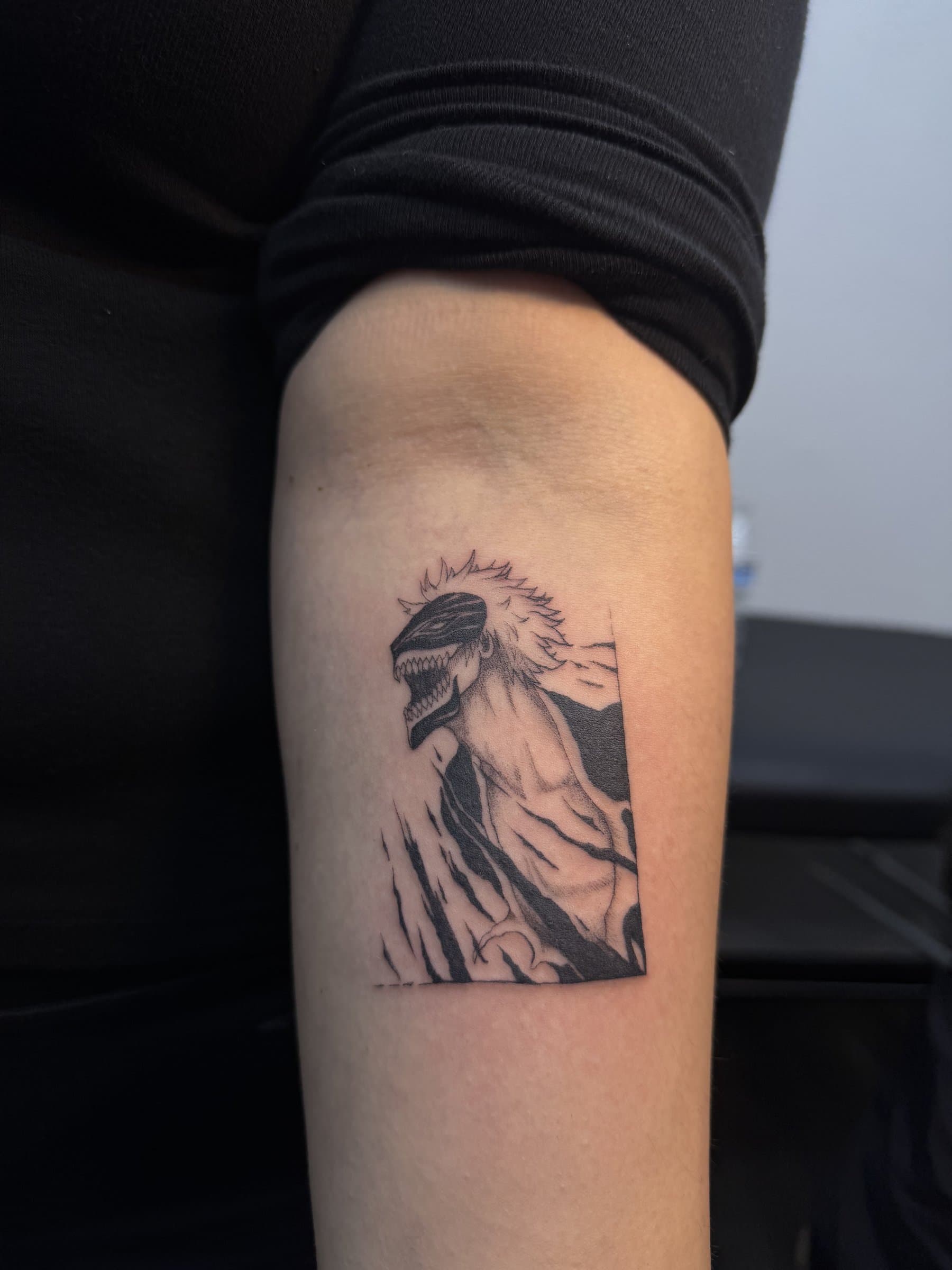 Fine-line tantō knife rib tattoo, single needle